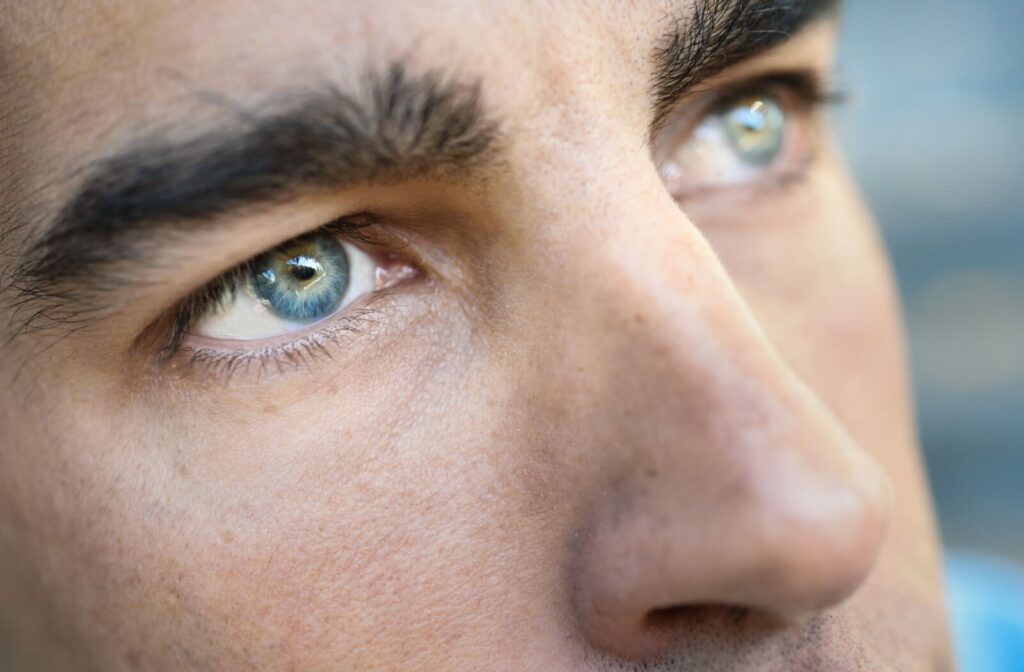 Close up of a man's eyes. Man has intense stare.
