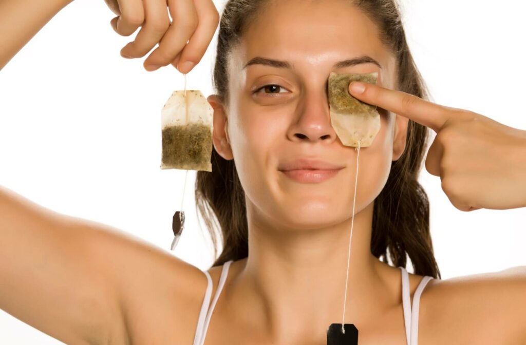 A patient uses steeped tea bags to help unclog blocked eyelid glands.